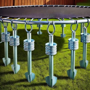 A set of trampoline ground anchors securing a 10-foot trampoline to the ground, ensuring stability during use.