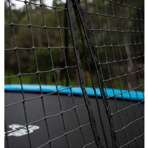 "Close-up of the durable safety enclosure net on a skybound trampoline, ensuring secure bouncing."