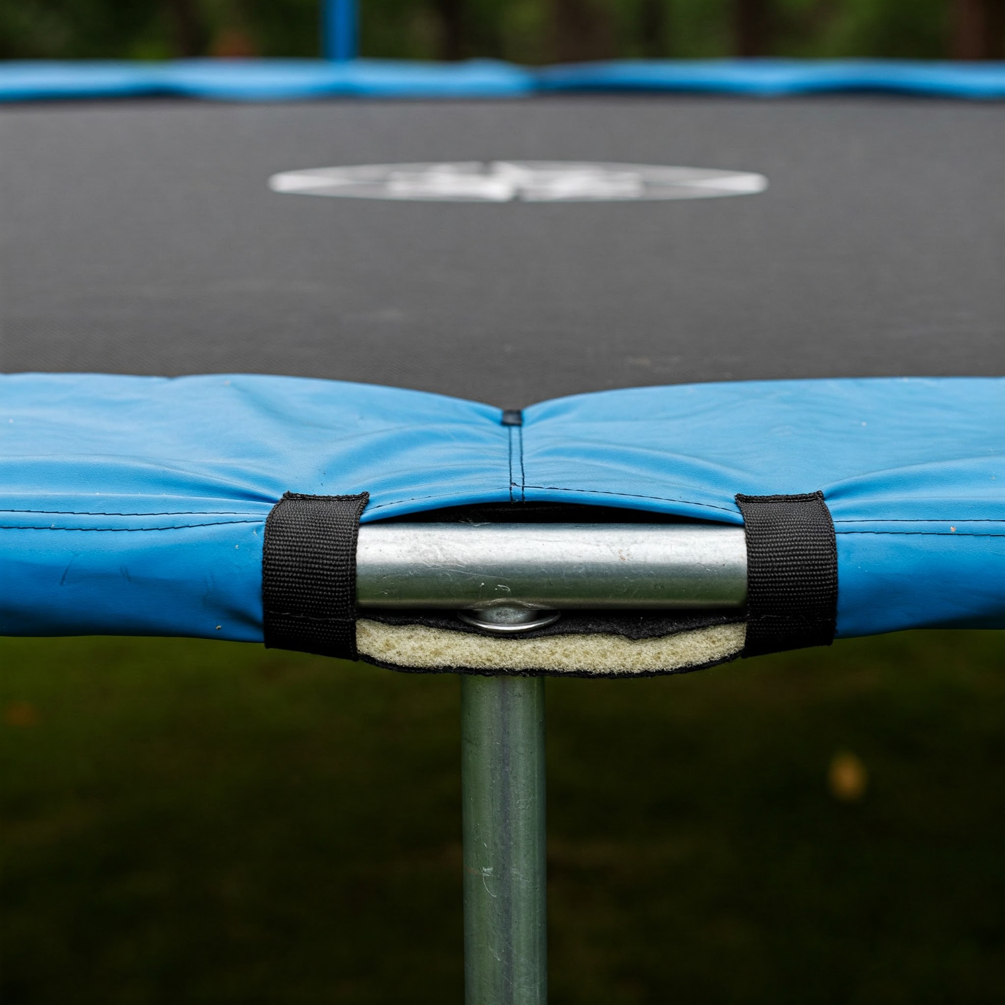 Trampoline Pad close-up view of a durable replacement showing its safety features and quality stitching.