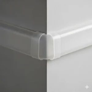 A soft, rubber corner guard installed on the sharp edge of a wall, highlighting a simple and effective non-toxic method to protect a baby.