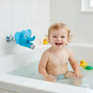 Close-up of a smiling toddler playing in the bath while protected from the hard faucet by a cushioned and safe baby bath spout cover. 