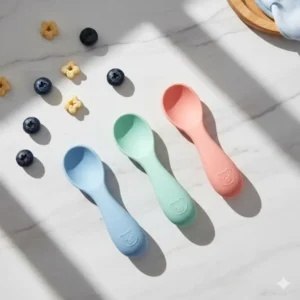 Ergonomic training spoons for babies designed as safe feeding utensils non toxic materials.