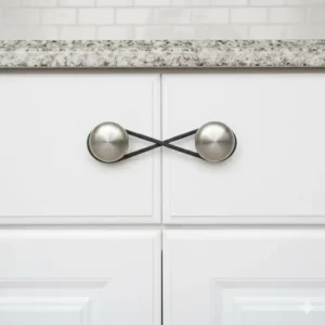 A thick rubber band used as a simple DIY cabinet lock without hardware for knobs.